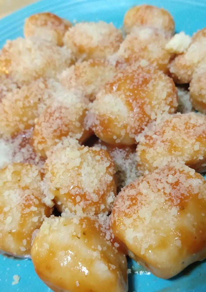 Una foto de Ñoquis rellenos de jamón y queso