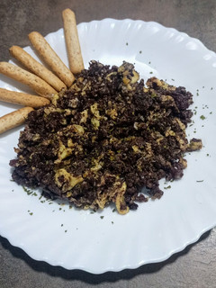 Una foto de Revuelto de morcilla de cebolla