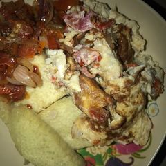 A picture of Fried yam,sauce and fry egg.