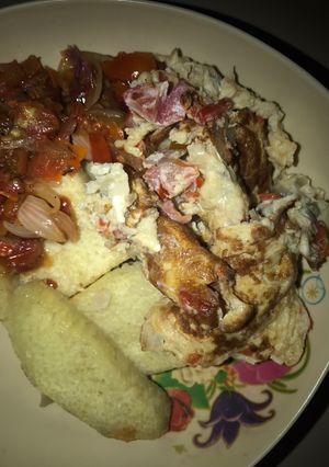 A picture of Fried yam,sauce and fry egg.