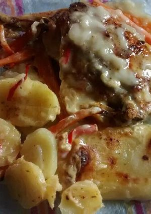 Una foto de Pollo a la leche y papas