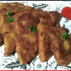 A picture of Tandoori potato triangles.