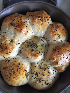 A picture of Bread Rolls with Stuffed Potatoes.