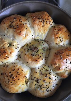 A picture of Bread Rolls with Stuffed Potatoes.