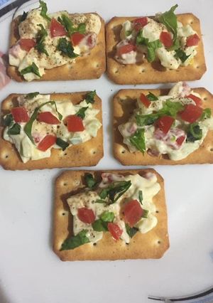 A picture of Tuc open sandwich.