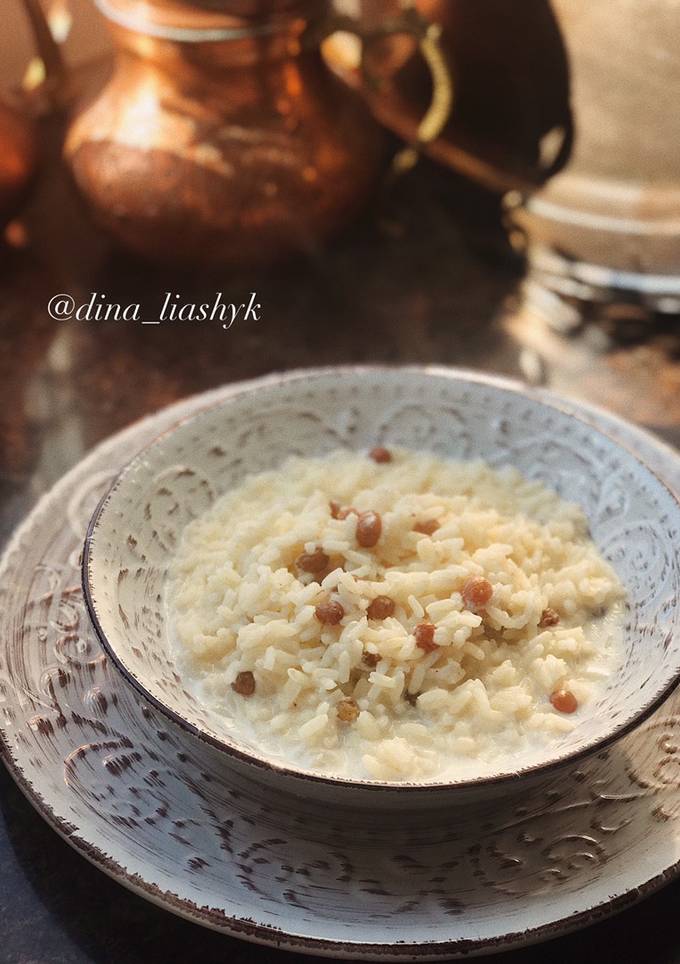 Рисовая молочная каша с изюмом в мультиварке