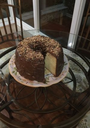 A picture of Butter pound cake with chocolate almond frosting.