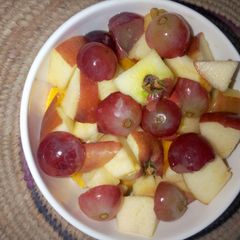 A picture of Dried fruit salad with honey and lemon juice dressing.