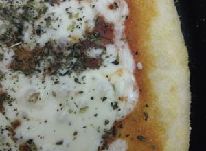 Una foto de Pizza (tipo Domino's o pizza hut)