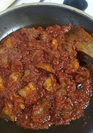 Una foto de Carne con tomate frito