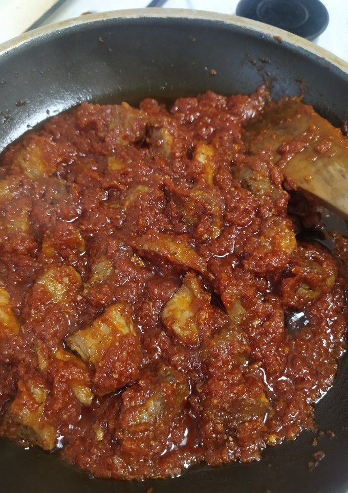 Una foto de Carne con tomate frito