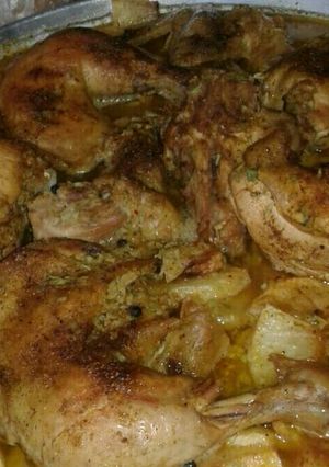 صورة لوصفة فخاد مع بطاطا وفطر بالفرن