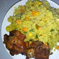 A picture of Fried rice with chicken.