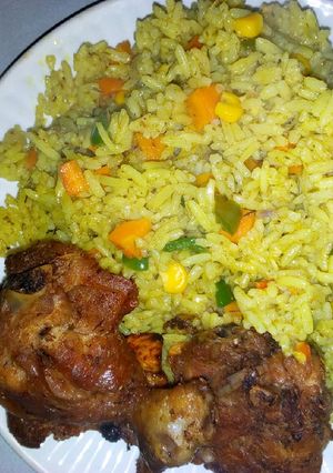 A picture of Fried rice with chicken.