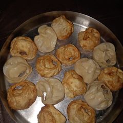 A picture of Momos steamed and fried.