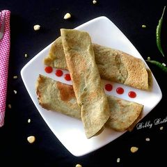 A picture of Sweet corn moong dal dosa.
