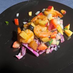 Garlic shrimps with peach salsa A picture of Garlic shrimps with peach salsa.