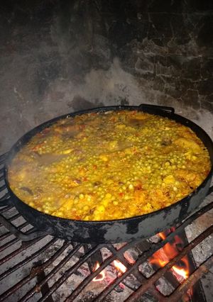 Una foto de Arroz con pollo al disco