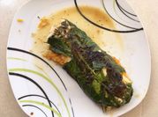 Une photo de dorade en papillote
