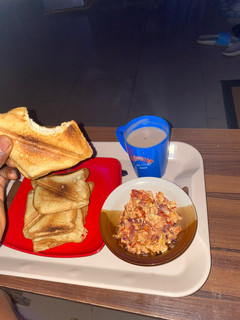 A picture of Toasted bread and fried egg breakfast.
