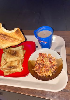 A picture of Toasted bread and fried egg breakfast.