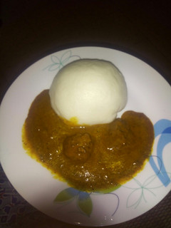 A picture of Pounded yam with dried okro/ogbono soup.