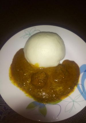 A picture of Pounded yam with dried okro/ogbono soup.