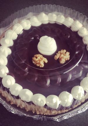 Una foto de Tartaleta de manjar nuez con ganeche de chocolate