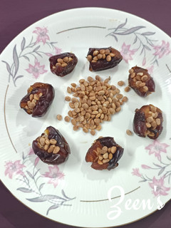 A picture of Dates and Charoli.