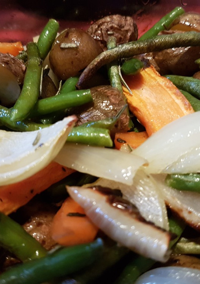 Una foto de Papas con Verduras al Horno