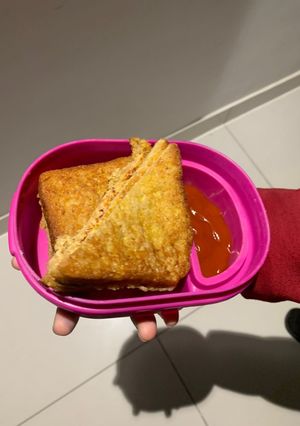 A picture of French toast (savoury) with cheese.