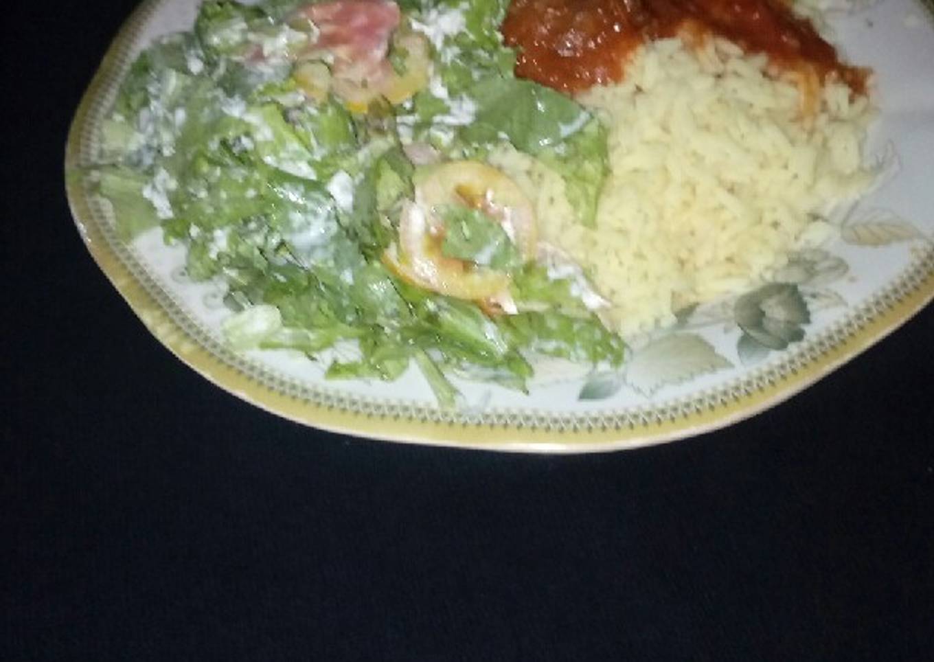 Rice and beef stew with salad