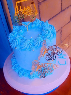 A picture of 4 layer 8" vanilla sponge cake.