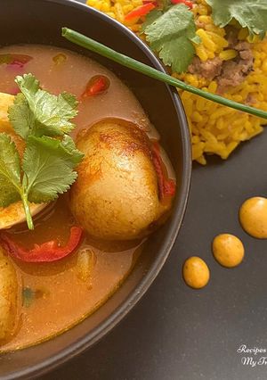 A picture of Egg & Potato Curry with Keema Rice.
