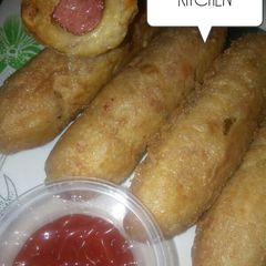 A picture of Yam with sausages.