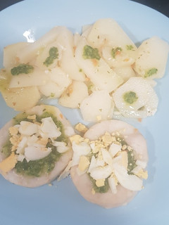 Una foto de Merluza al horno con papas