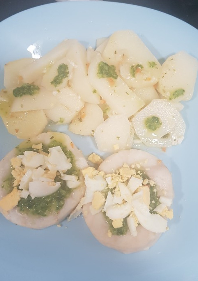 Una foto de Merluza al horno con papas