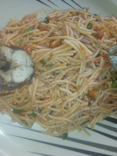 A picture of Spagetti with scent leaves.