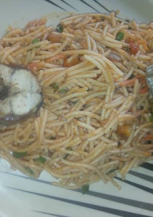 A picture of Spagetti with scent leaves.