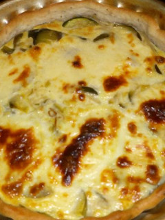 Una foto de Tarta de zapallitos con masa casera