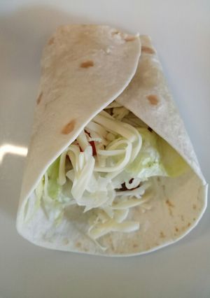 A picture of Quick chilli, bean n salad wrap.