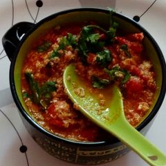 A picture of Tomato egg drop soup.