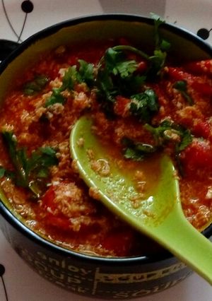 A picture of Tomato egg drop soup.