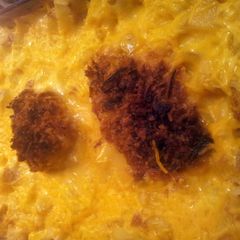 A picture of Crusted Chicken breast and potatoes.