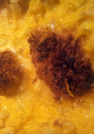 A picture of Crusted Chicken breast and potatoes.