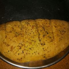 A picture of Domino's style garlic bread.