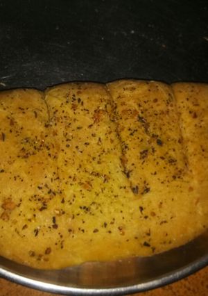 A picture of Domino's style garlic bread.