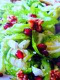 Shaved Brussels with Toasted Walnuts and Fresh Pomegranate.