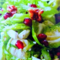 A picture of Shaved Brussels with Toasted Walnuts and Fresh Pomegranate..