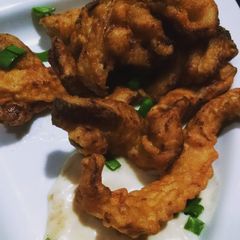A picture of Crispy Chicken Strips with cheesy mayo dip.